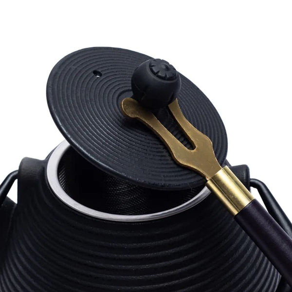 Theepot Dekselhouder