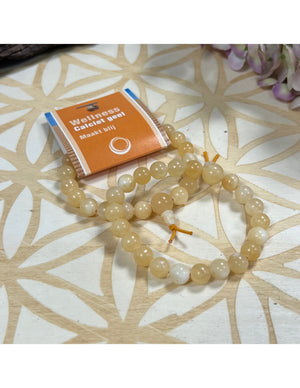 Calciet geel powerbead armband + kaart