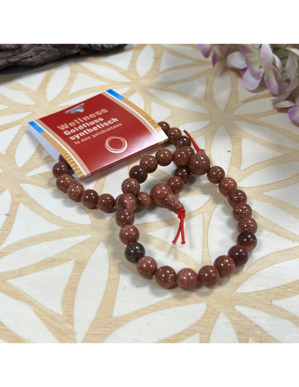 Goldfluss powerbead armband (synth)